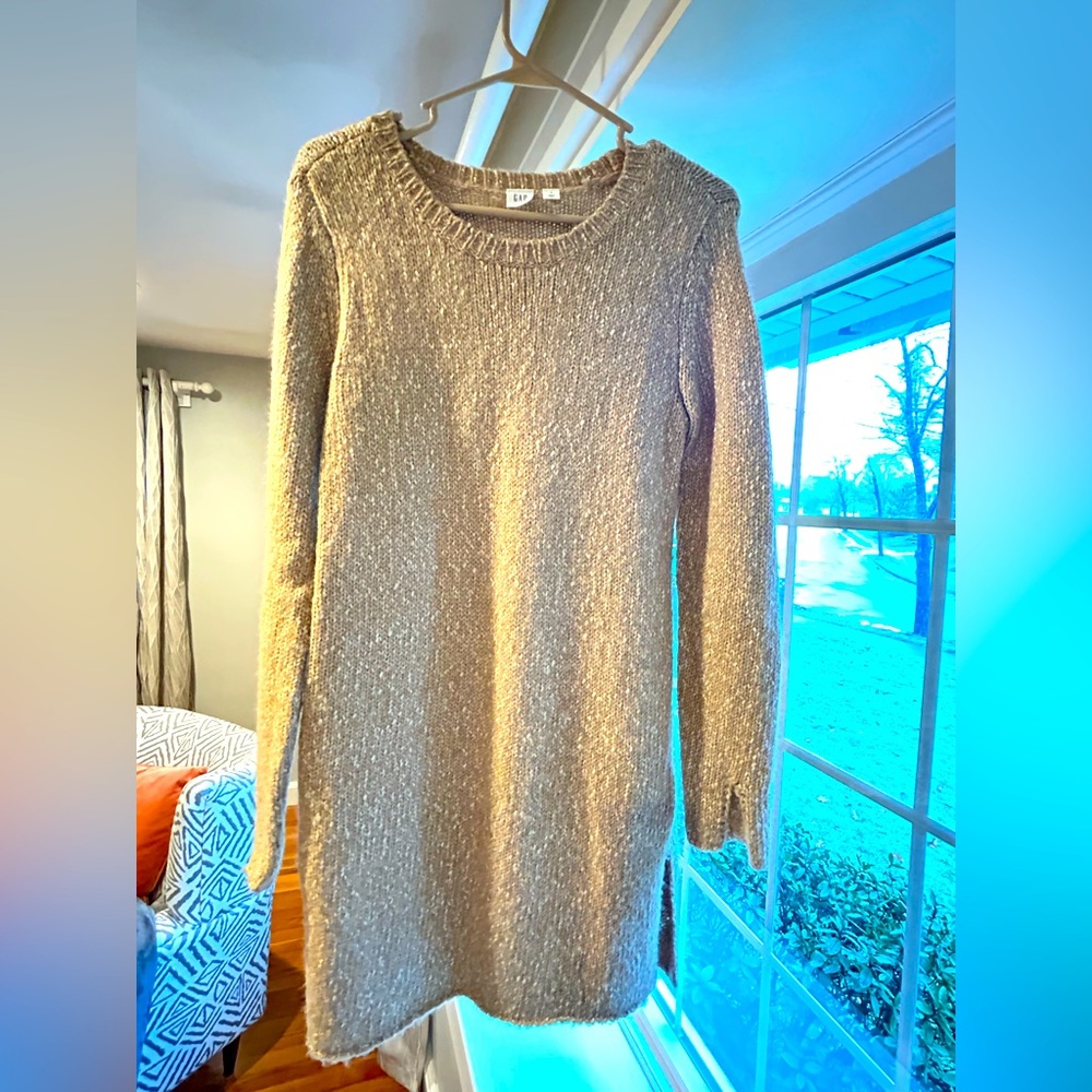 Warm tunic style sweater- cotton, alpaca, and acrylic blend which is very warm.